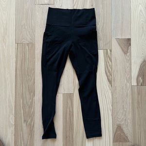 Athleta salutation stash pocket II tight